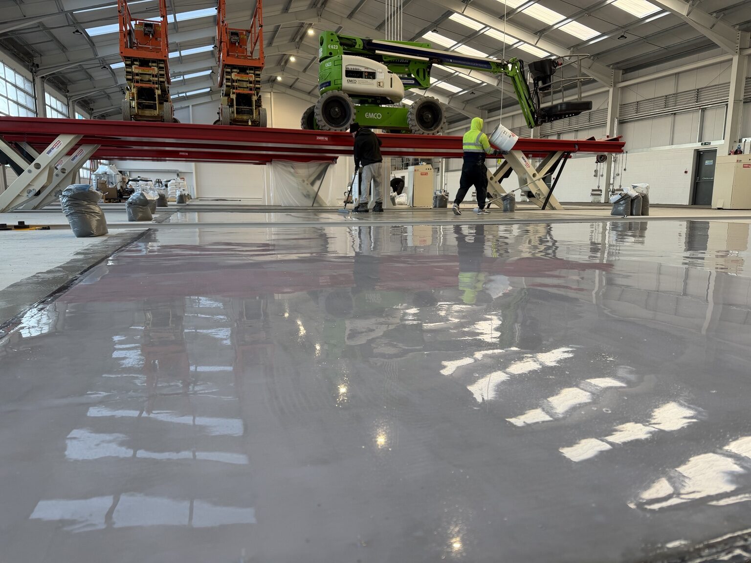 Large industrial resin floor being installed