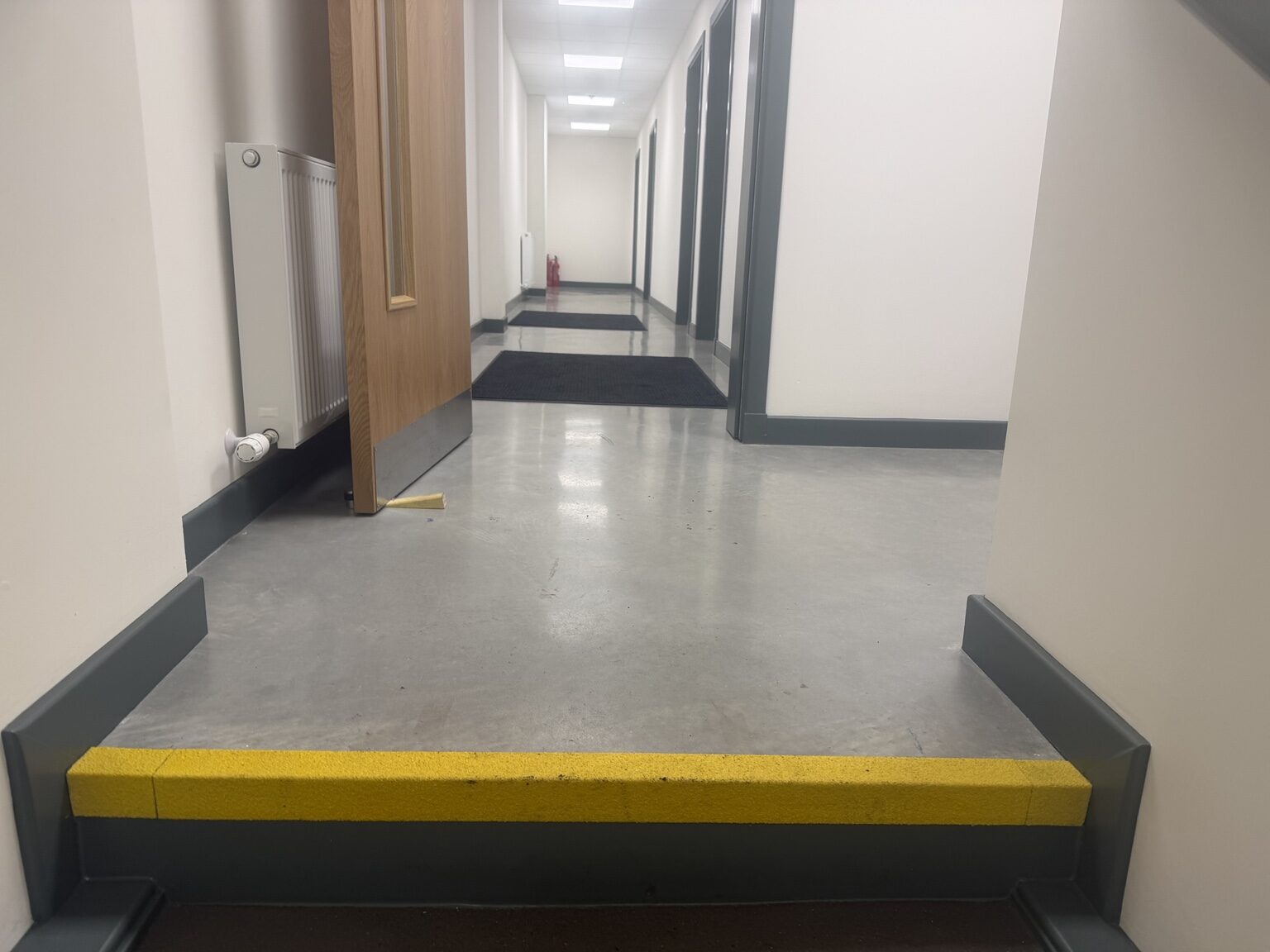 Polished concrete floor in a commercial corridor