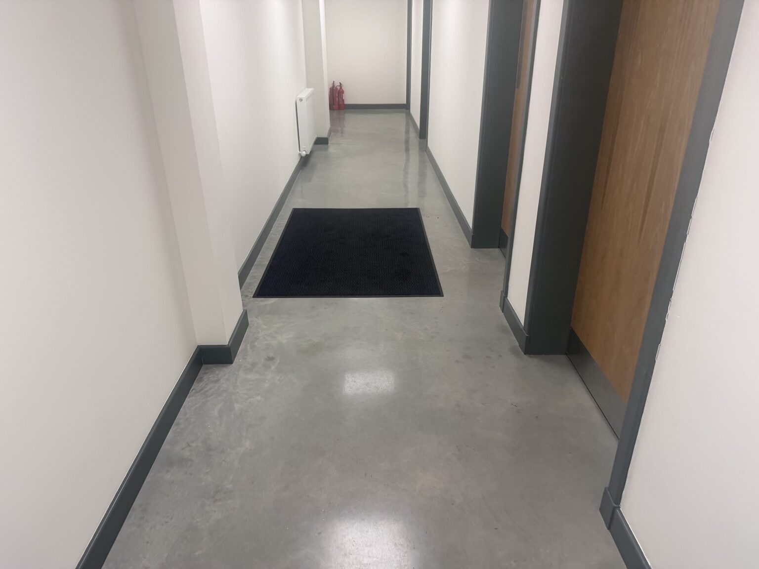 Polished concrete floor in an office corridor