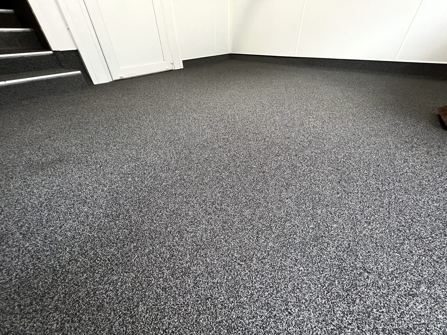 Dark decorative flake residential floor